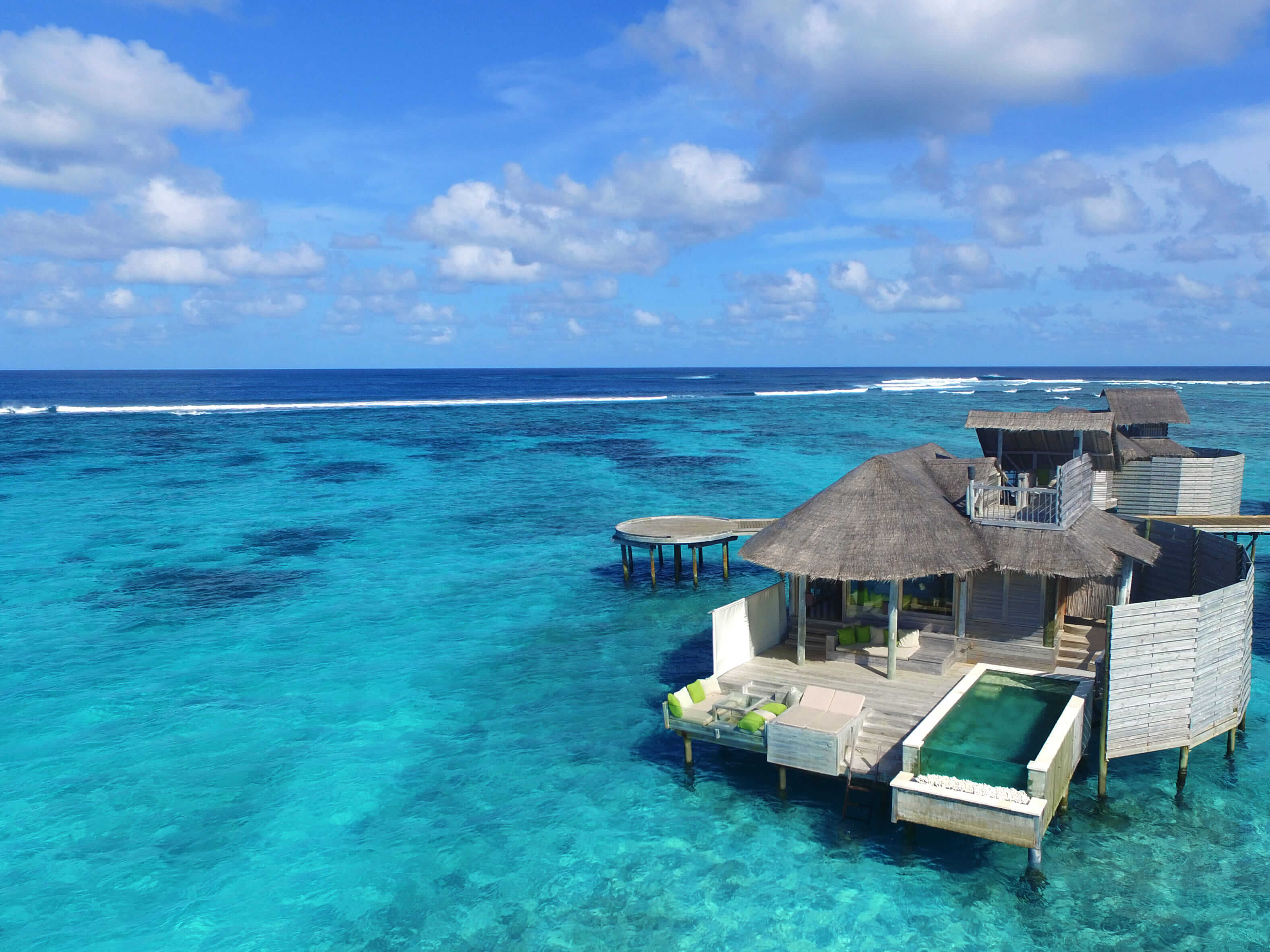 aerial view of an overwater villa at Six Senses Laamu, Maldives